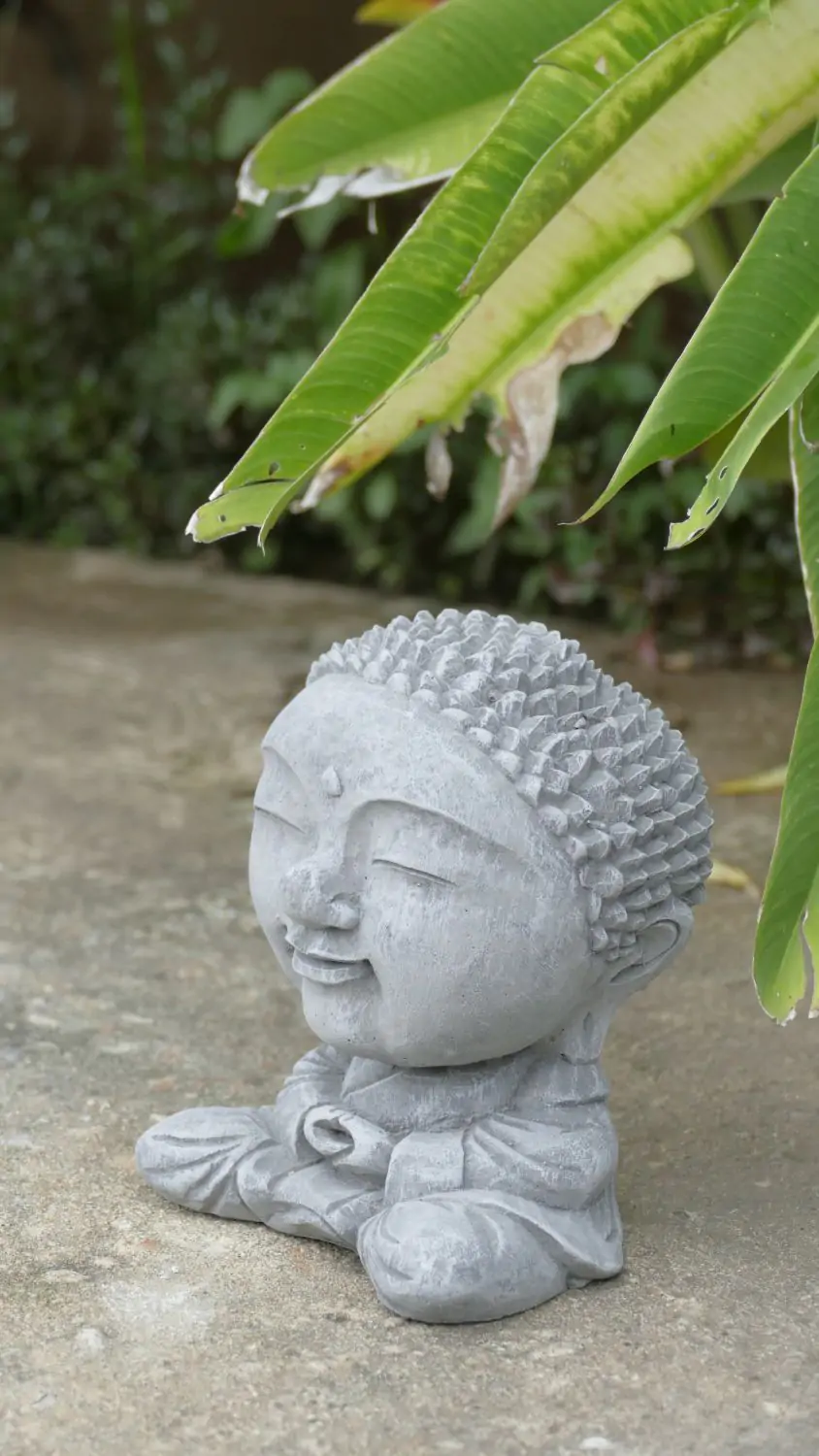  Product image 3 of the product “Nima - Sitting monk with big head, 15 cm H | cast stone ”